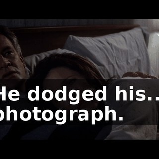 He dodged his... photograph.