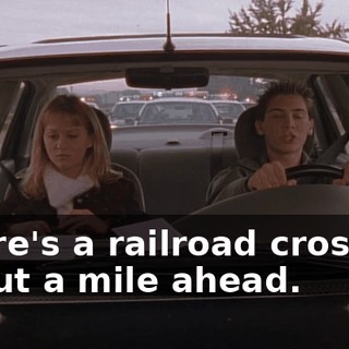 There's a railroad crossing about a mile ahead.