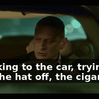 Walking to the car, trying to rip the hat off, the cigar off.