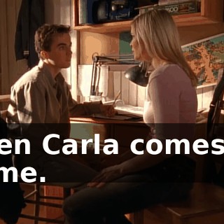 when Carla comes up to me.