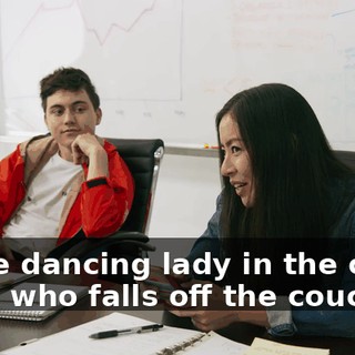 of the dancing lady in the clown mask who falls off the couch?