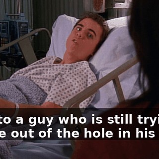 next to a guy who is still trying to smoke out of the hole in his neck!