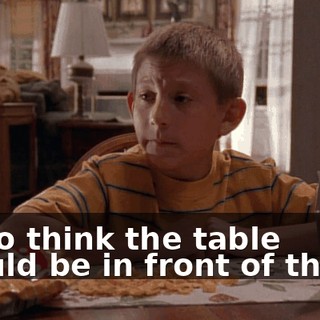 I also think the table should be in front of the TV