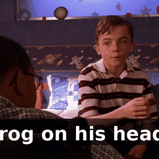 Frog on his head.