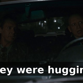 They were hugging.