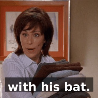 with his bat.