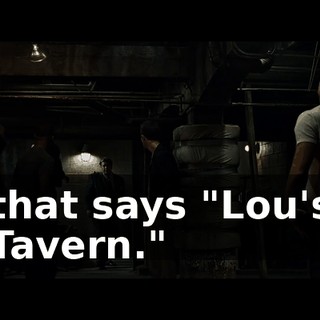 that says "Lou's Tavern."