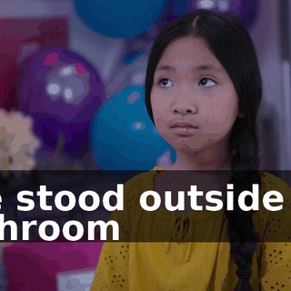 She stood outside the bathroom
