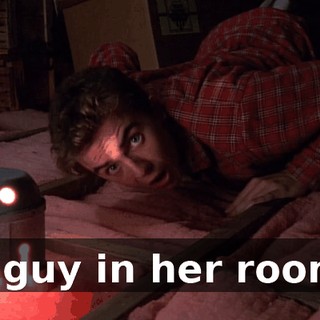 A guy in her room.