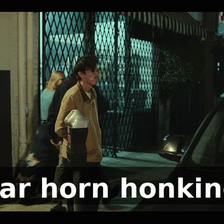 [car horn honking]