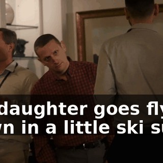 My daughter goes flying down in a little ski suit.