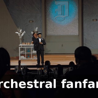 [orchestral fanfare]