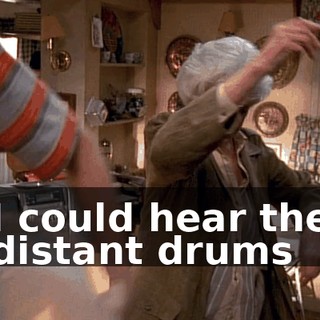 ♪ I could hear the distant drums ♪