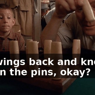 it swings back and knocks down the pins, okay?