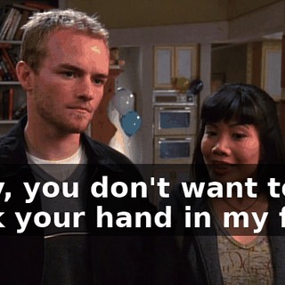 Lady, you don't want to stick your hand in my face.