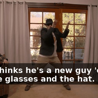 She thinks he's a new guy 'cause of the glasses and the hat.