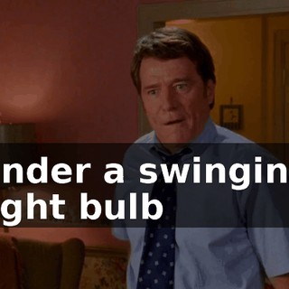 under a swinging light bulb