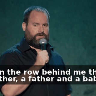 and in the row behind me there's a mother, a father and a baby.
