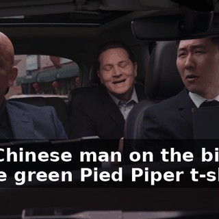 The Chinese man on the bicycle in the green Pied Piper t-shirt.