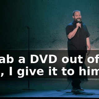 I grab a DVD out of my bag, I give it to him.