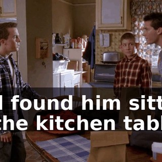 and found him sitting at the kitchen table