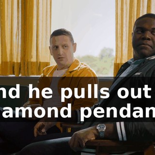 and he pulls out a diamond pendant.