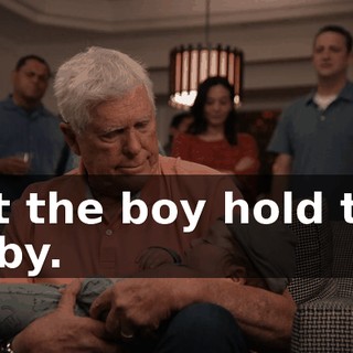 Let the boy hold the baby.