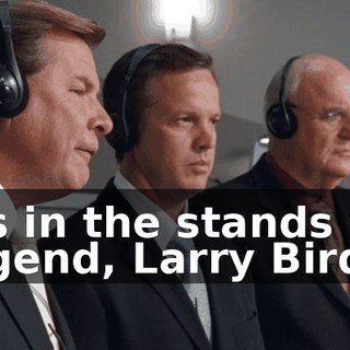 ...who's in the stands with an NBA legend, Larry Bird.