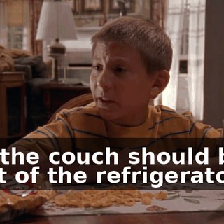 and the couch should be in front of the refrigerator.