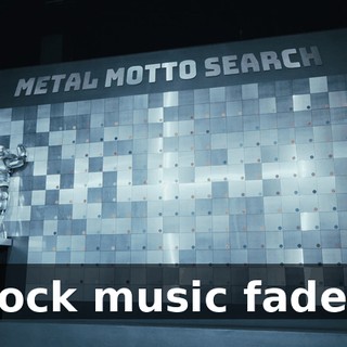 [rock music fades]