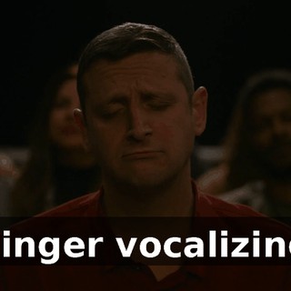 [singer vocalizing]