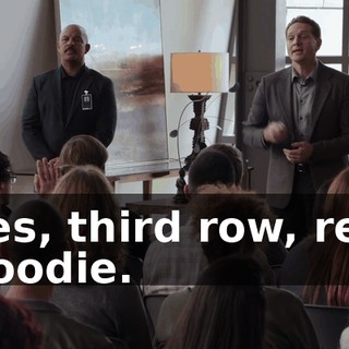 Yes, third row, red hoodie.