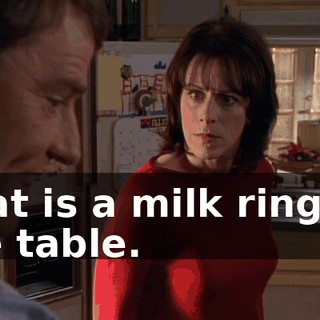 That is a milk ring on the table.