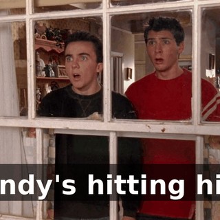 Randy's hitting him.